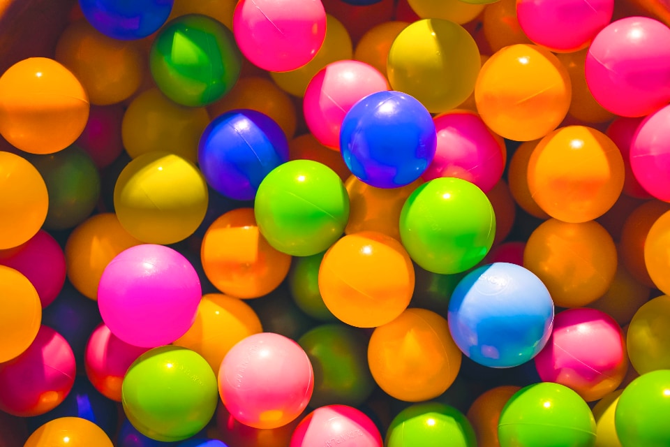 High angle photo of assorted-colour plastic balls.